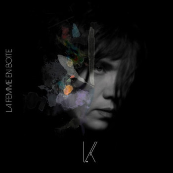 K - La femme en boîte