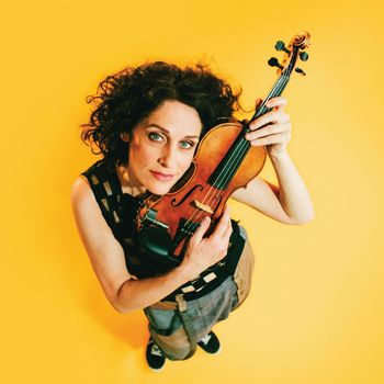 Turns the Wagon Wheel (feat. Bill Frisell)