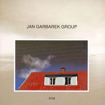 Jan Garbarek Group - Photo With Blue Sky, White Cloud, Wires, Windows And A Red R