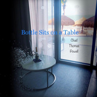Chad Thomas Powell - Bottle Sits on a Table