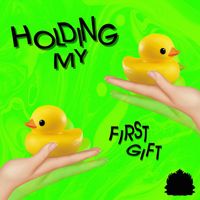First Gift - Holding My