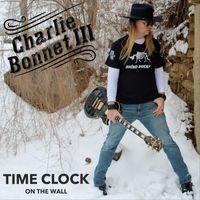 Charlie Bonnet III - Time Clock on the Wall
